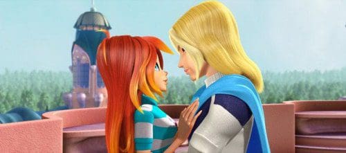 Two animated characters standing close together on a balcony. The girl has long, bright orange hair and is wearing a striped shirt. The boy has long, blonde hair and is dressed in a white and blue outfit. A colorful tower can be seen in the background.
