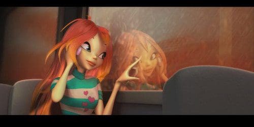 A young woman with long, flowing orange hair and a striped shirt with heart patterns sits in a bus. She gazes thoughtfully out the rain-specked window, where her reflection softly blends with the scene outside.