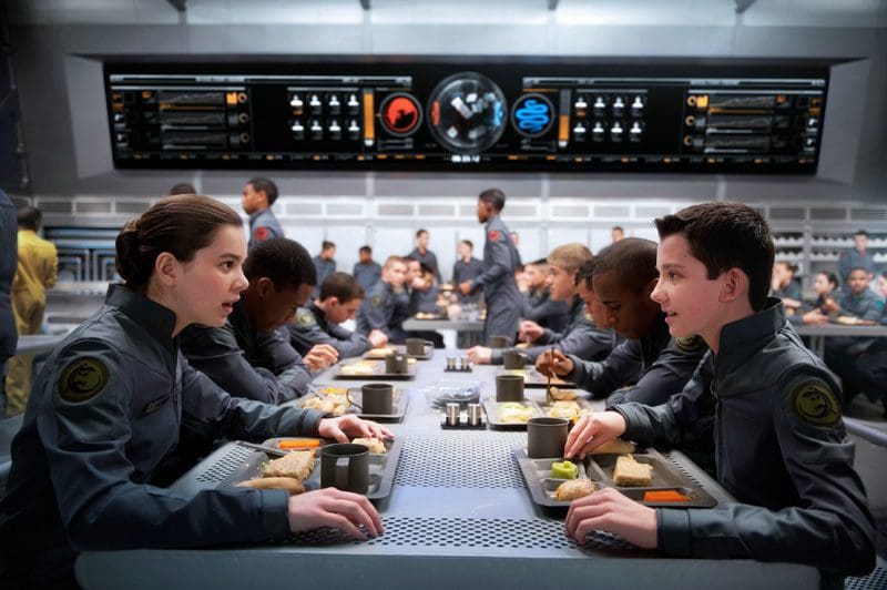 Students eating in a futuristic cafeteria