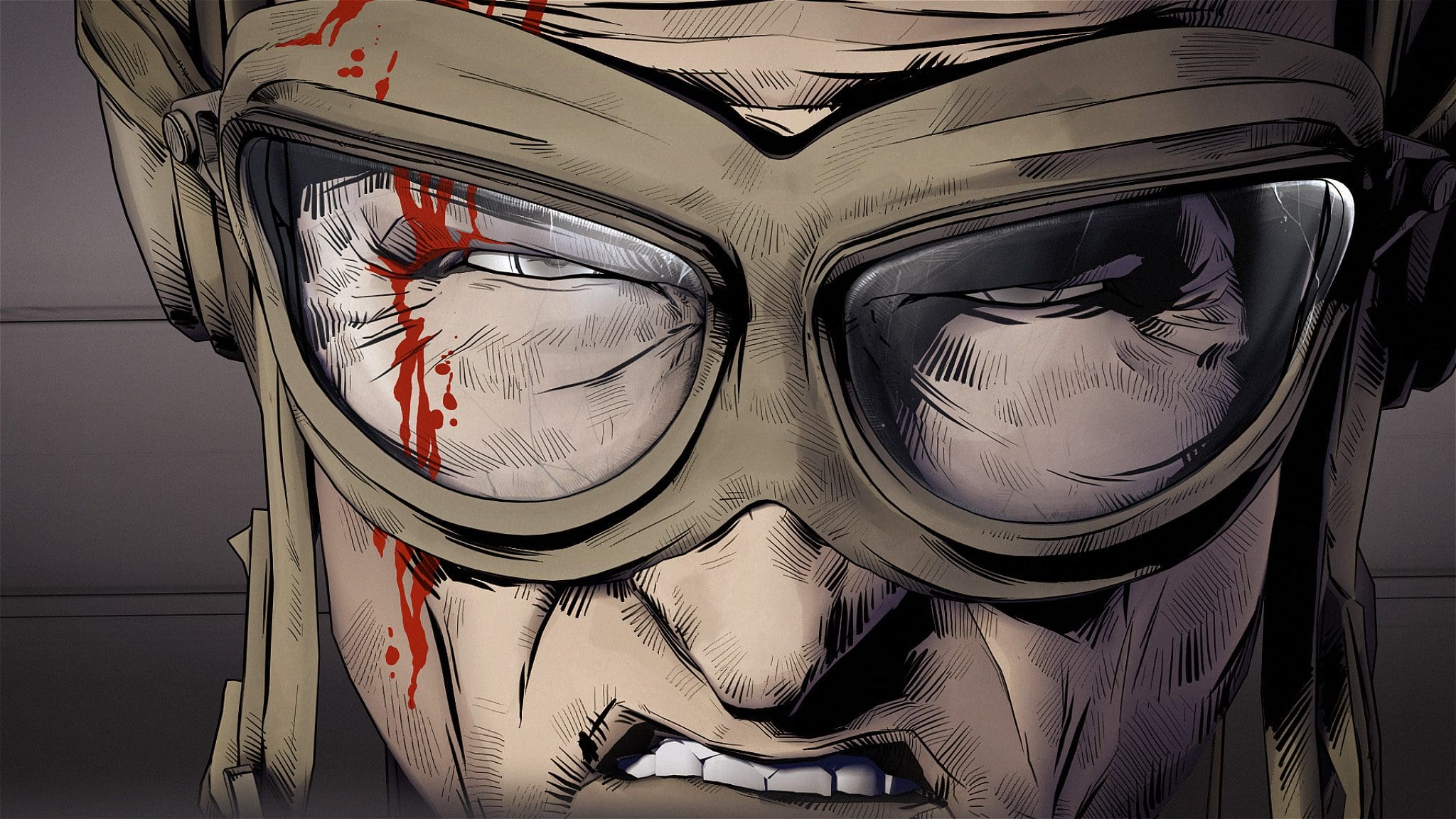 A close-up of a man wearing goggles with a blood streak on his forehead.