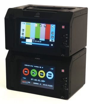 Two digital video recorders stacked with LCD displays showing playback controls and user interface elements.