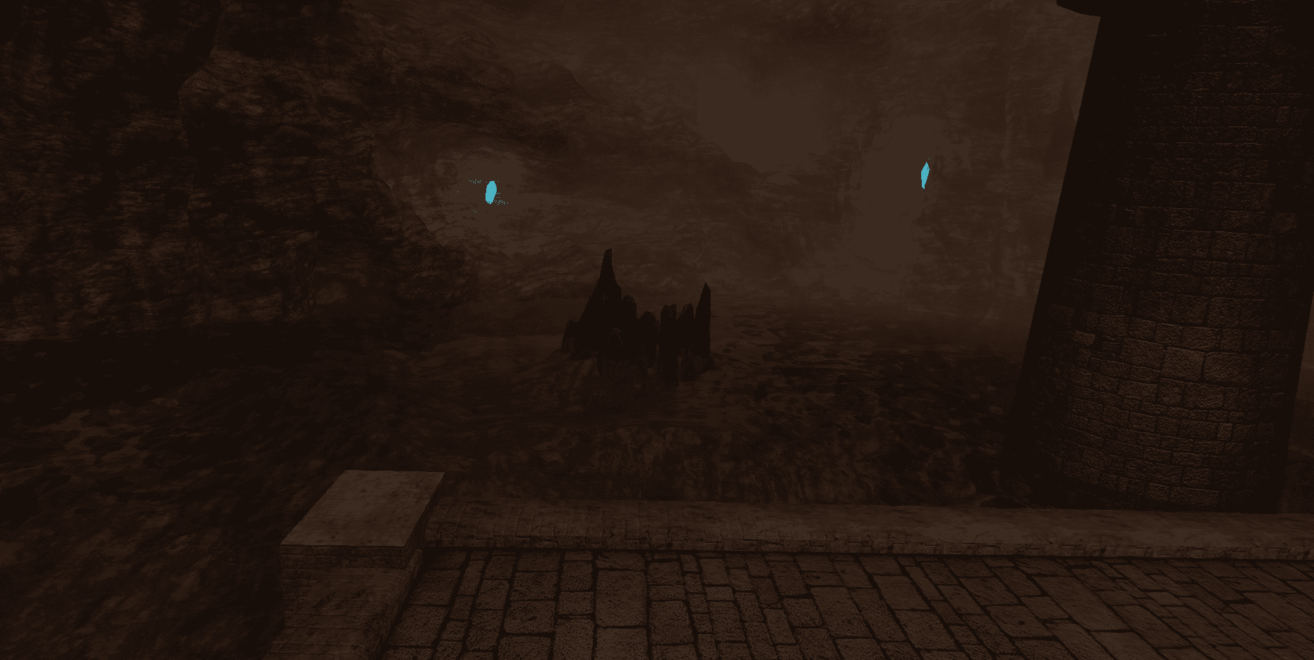 A dark cave interior with rocky formations and blue glowing spots.
