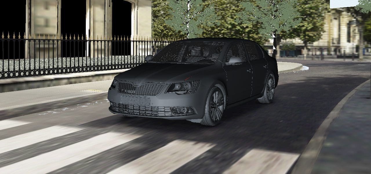 A dark sedan parked on a city street near trees and buildings.