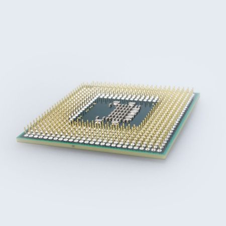 Computer processor with gold pins on a light background