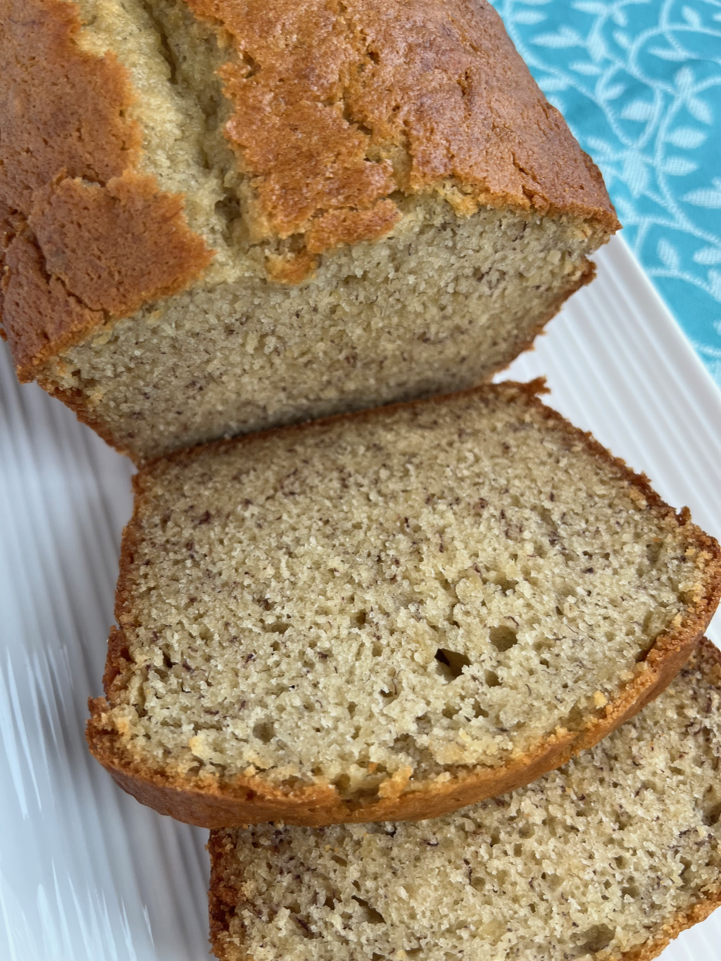 Delicious banana bread made with butter, sugar, flour and buttermilk, sliced in thick delicious slices.