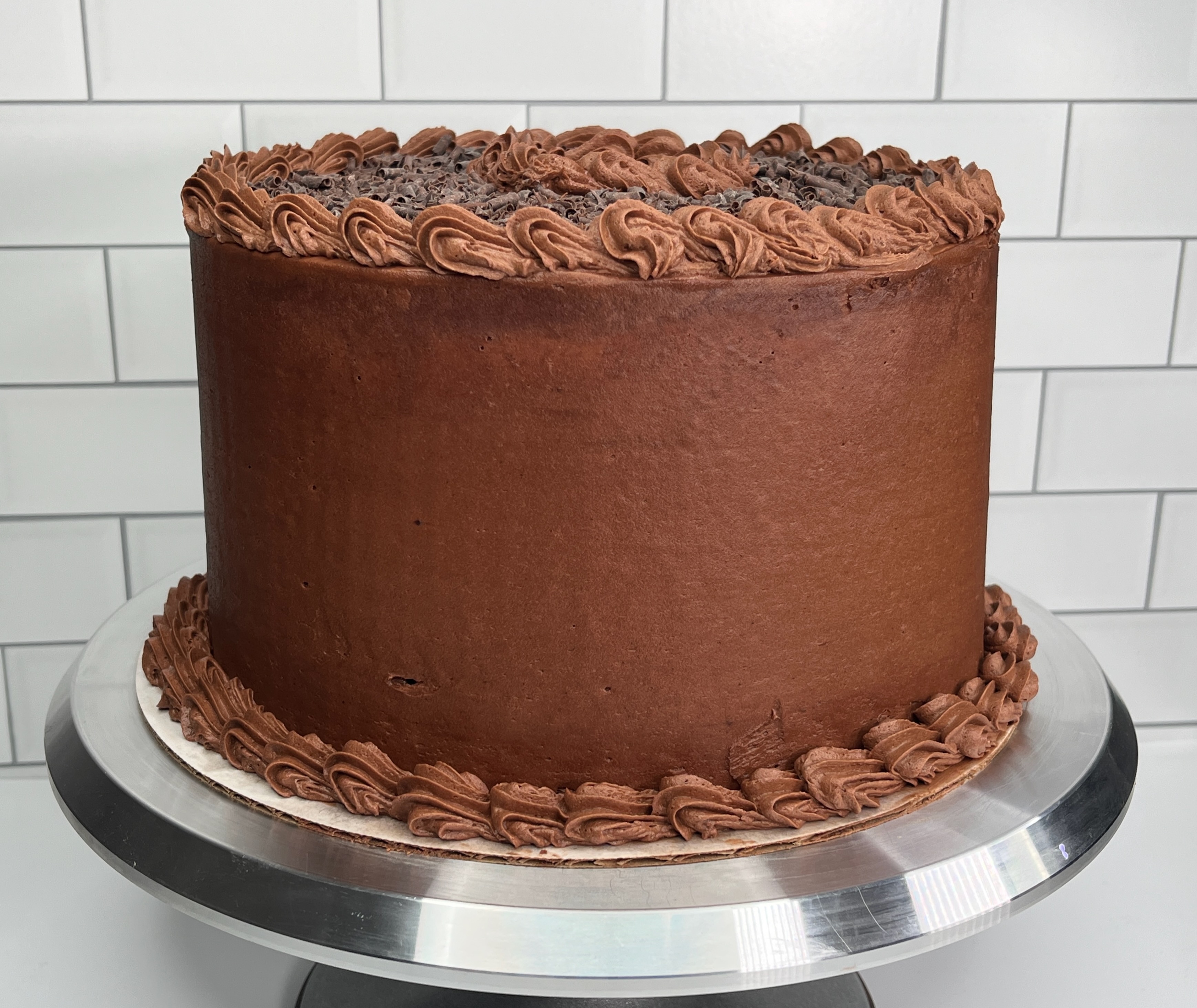 The Best Chocolate Cake is three layers of delicious cake made with buttermilk and sour cream. Then it is frosted with the most amazing chocolate frosting.