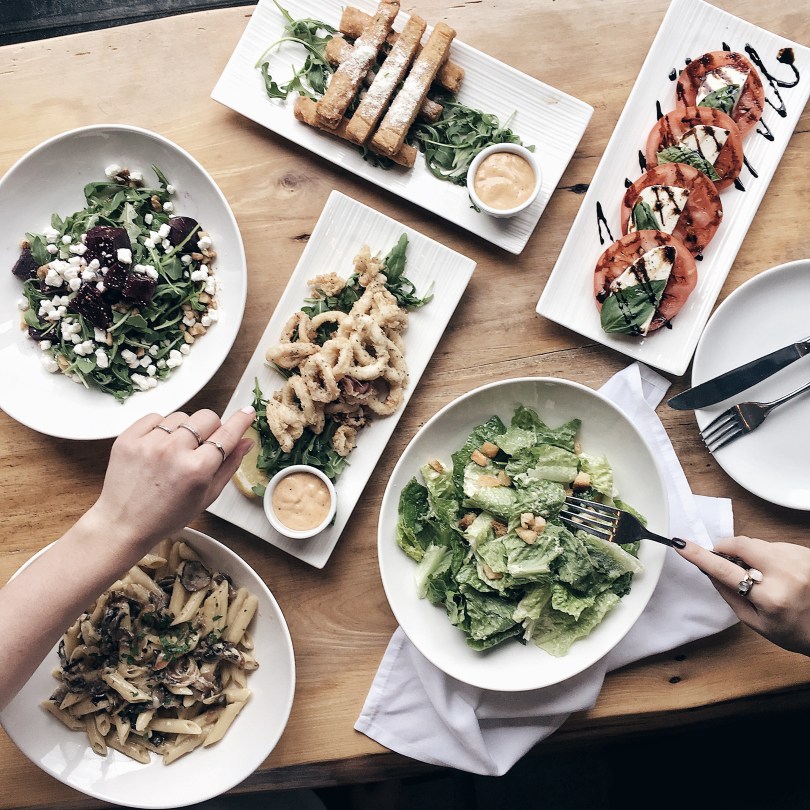 Digging in to our appetizers at Lambretta Pizzeria & Wine Bar