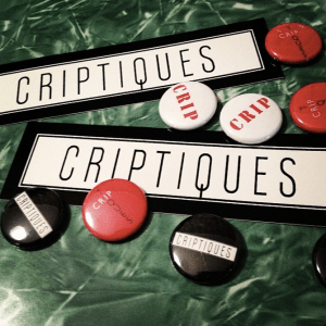 two stickers with black text against a white background that reads 'Criptiques.' Seven buttons in red, black and white varieties. They read either 'Criptiques' or 'Crip' in bold red text against a white background