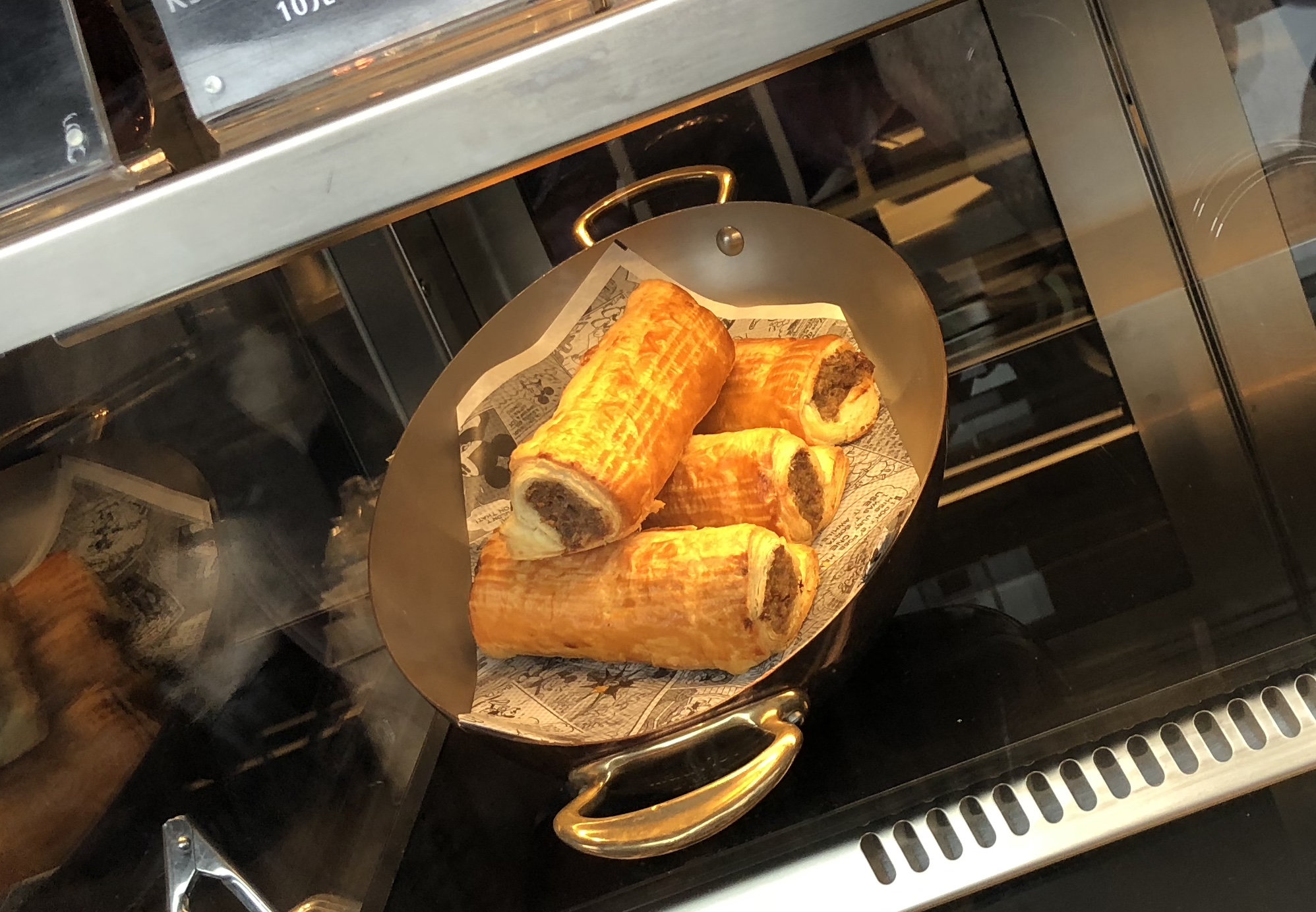 The sausage roll at Spiral Snacks in Tomorrowland is yummy! Served all day, in the USA it would probably be a breakfast item