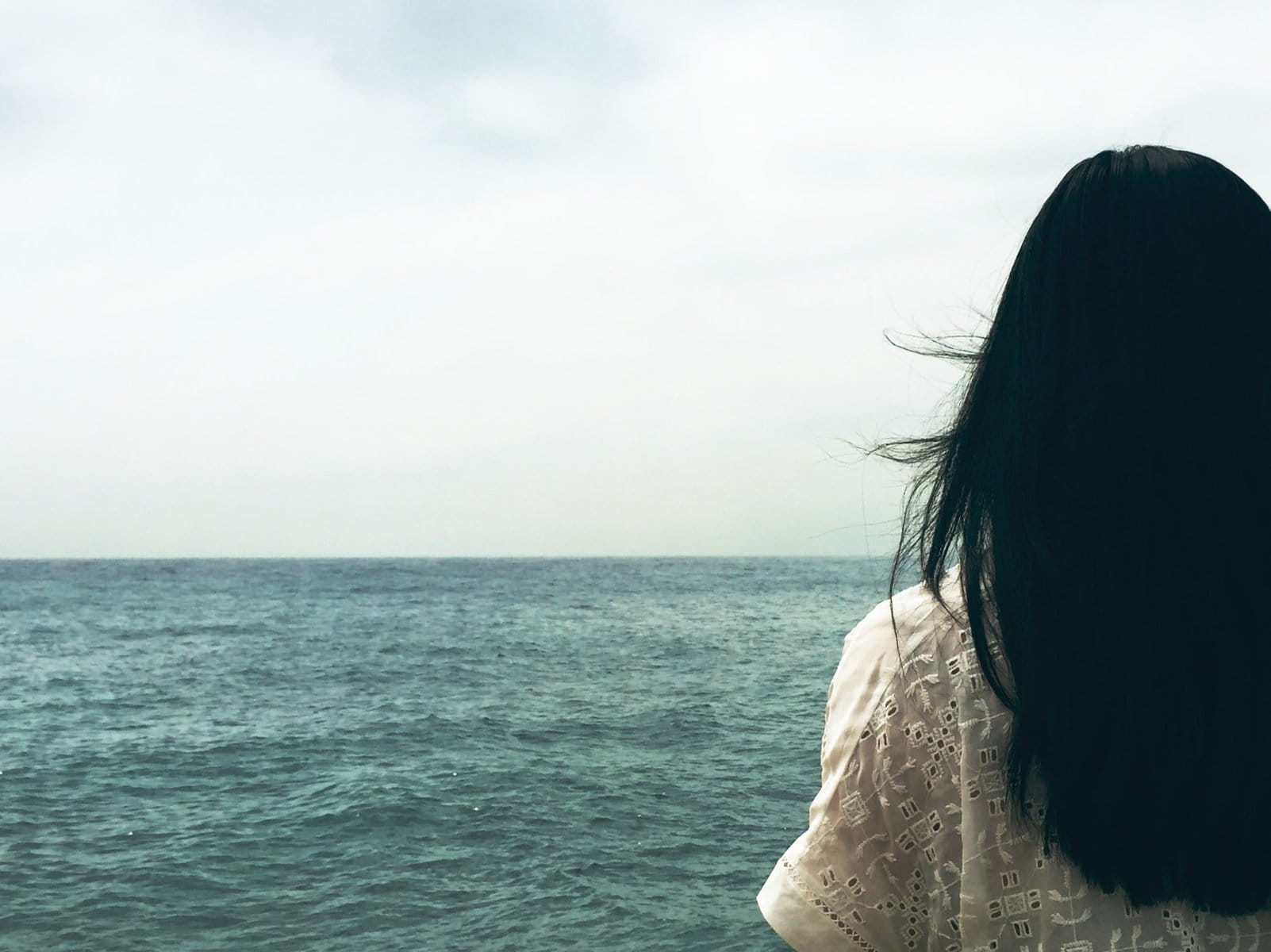 a solitary woman pondering a name change after divorc