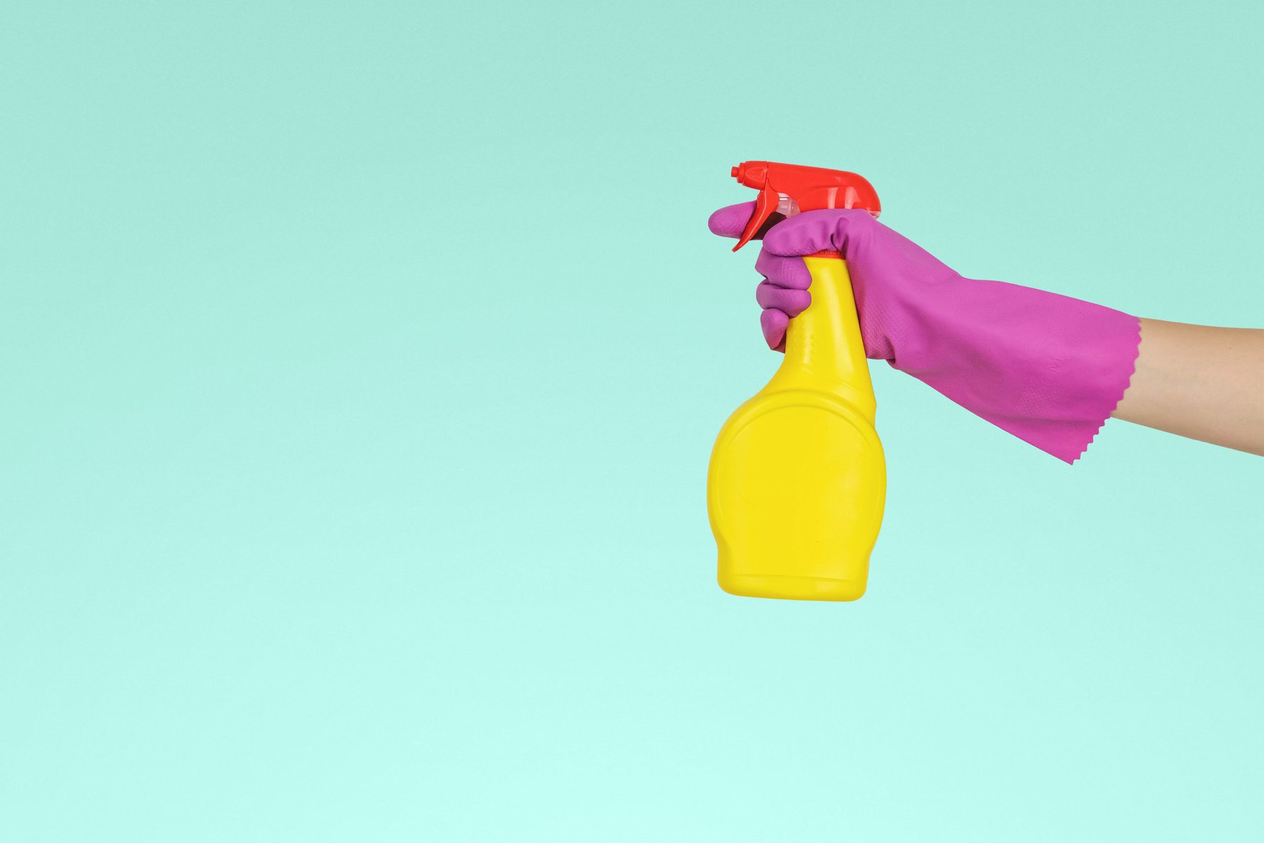 a squirt bottle of cleaning solution represents what a good spring cleaning after divorce can represent