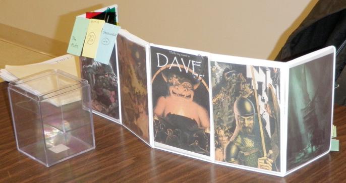 Mini dungeon master's screen on table