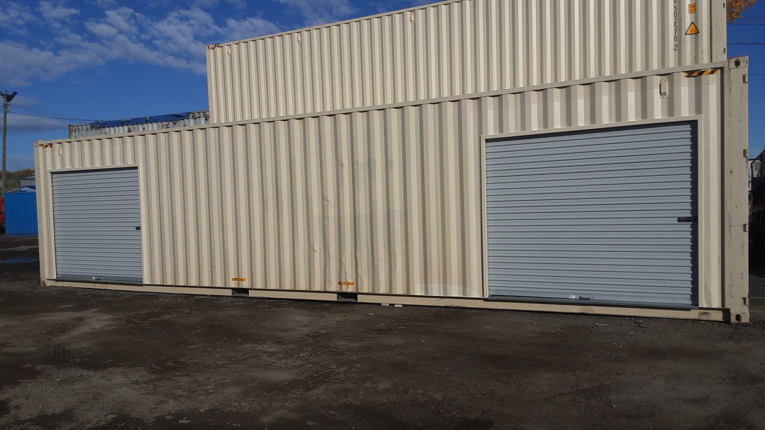 40′ High Cube Rollup Door Shipping Container DMD Containers