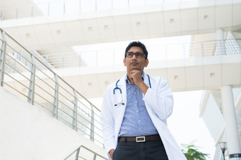 Young doctor thinking beyond the book How Doctors Think