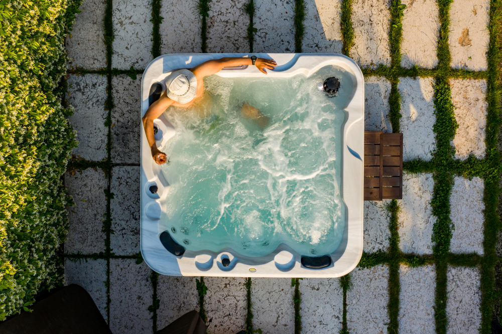 Man,Relaxing,In,Whirlpool,At,Sunny,Day