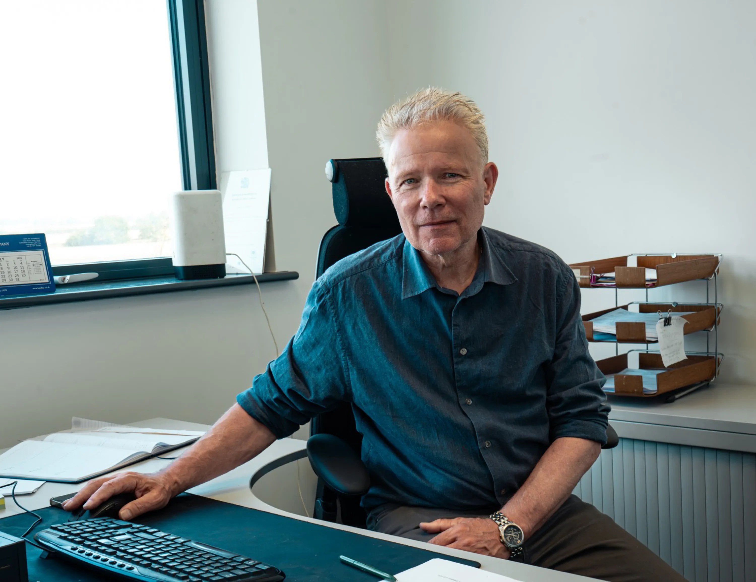 Greg Hollis, co-founder of Dolphin Removals, in the office