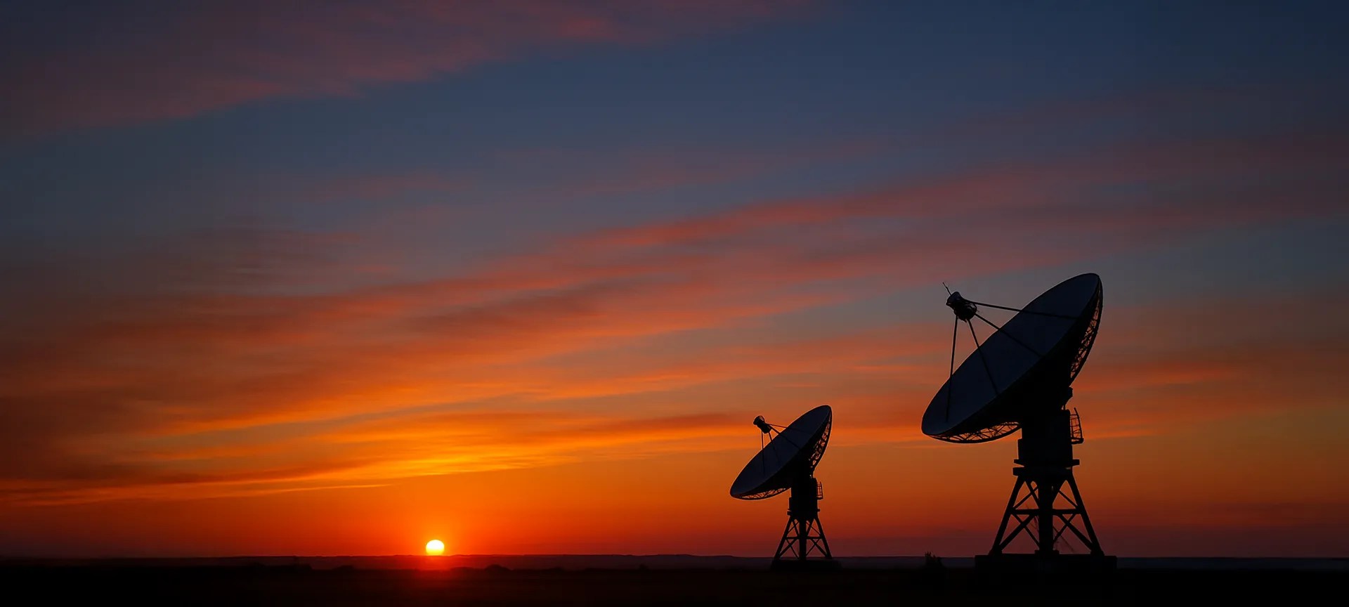 parabol antennas in sunset