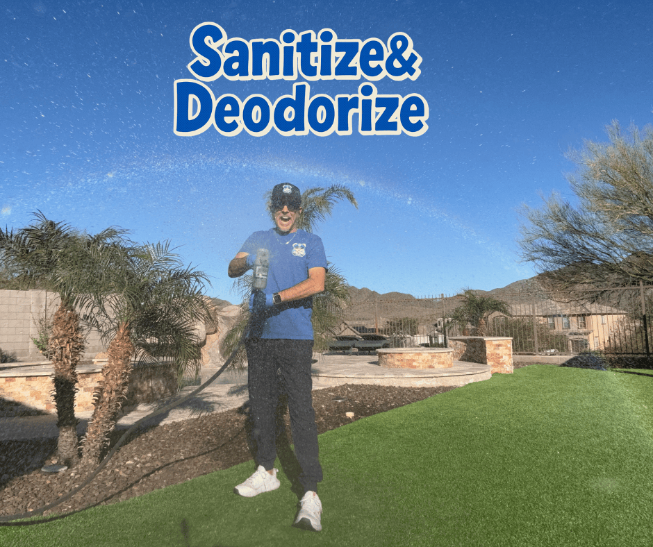 Bryan spraying an outdoor pet area, with Sanitize and Deodorize artwork.