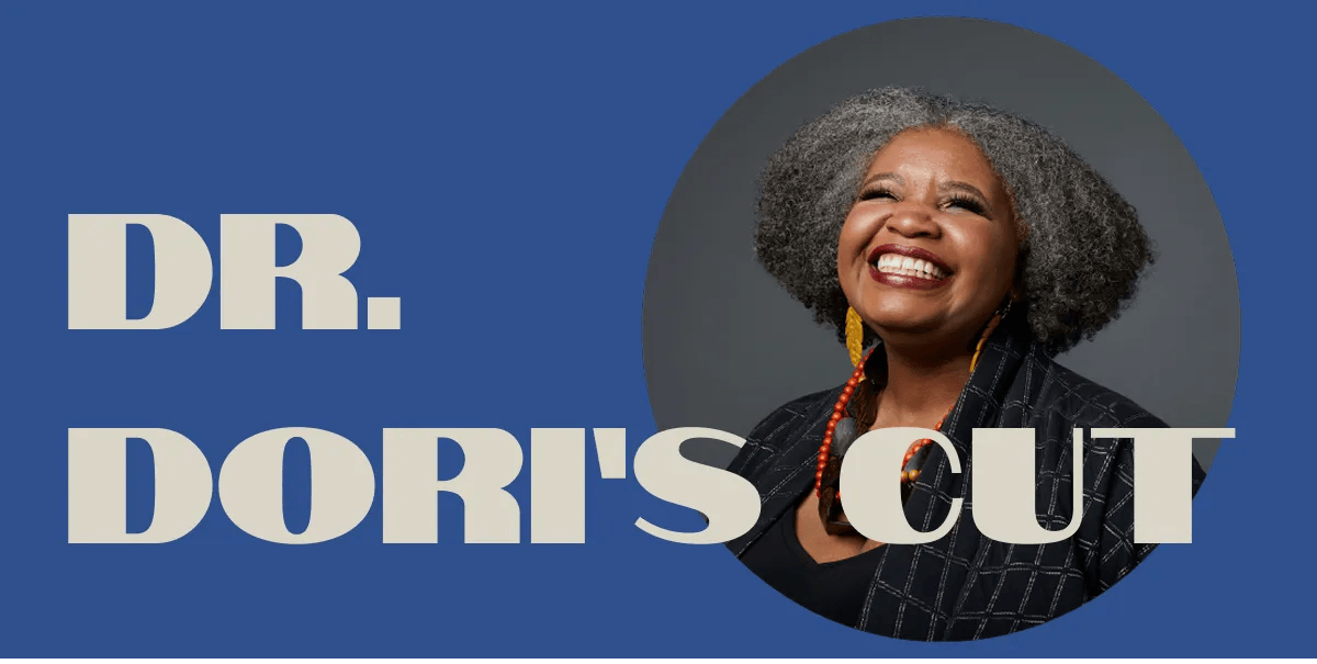 Portrait of Dori, a smling brown-skinned woman with the words Dr. Dori's Cut in light gray on a dark blue background.
