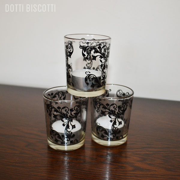 Black Design glass tealight holders. Available: XXX