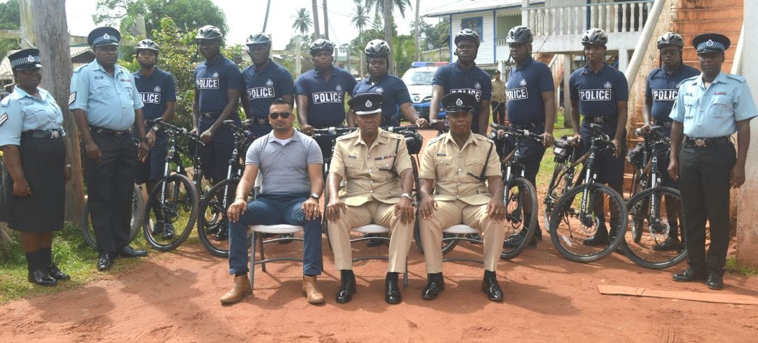 E’ Division police ranks pose with Divisional Commander Anthony Vanderhyden (centre sitting) and traffic Inspector Shawn Massey (right) and CID Inspector (left)