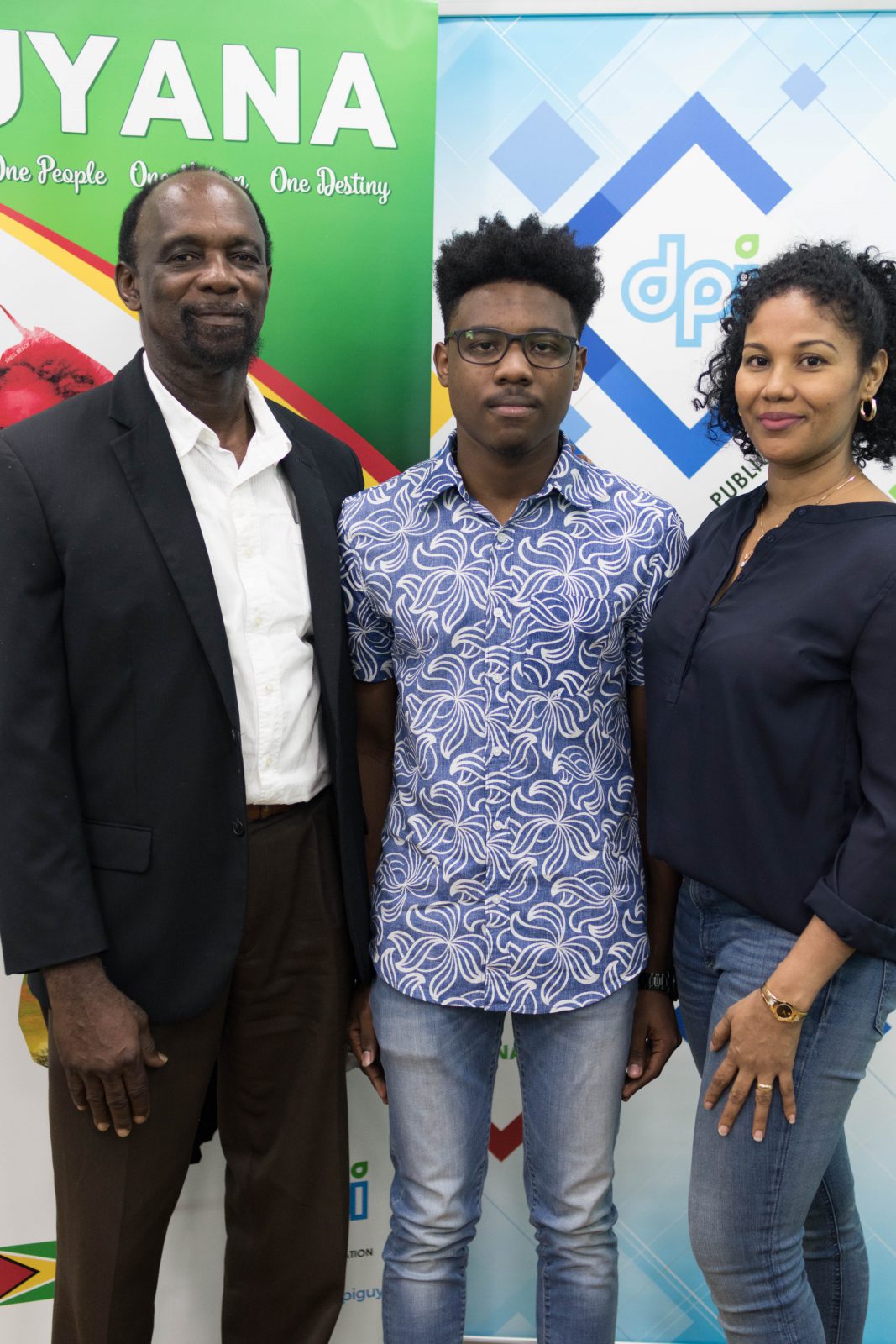 Christian Pile with his parents, Nigel Pile and Fayann Simpson-Pile