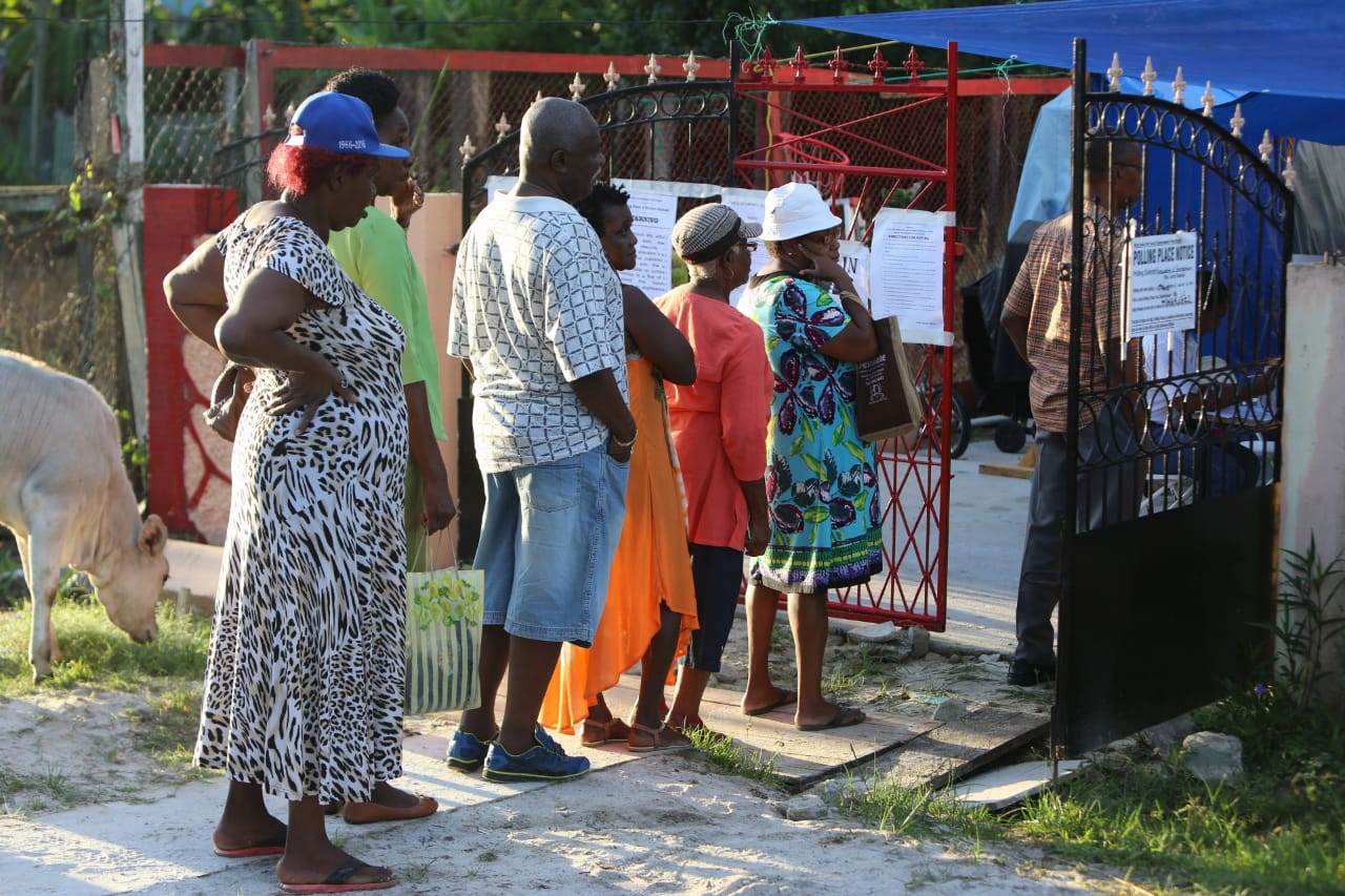 Voters waiting at a polling station in Georgetown to cast their votes for the LGE