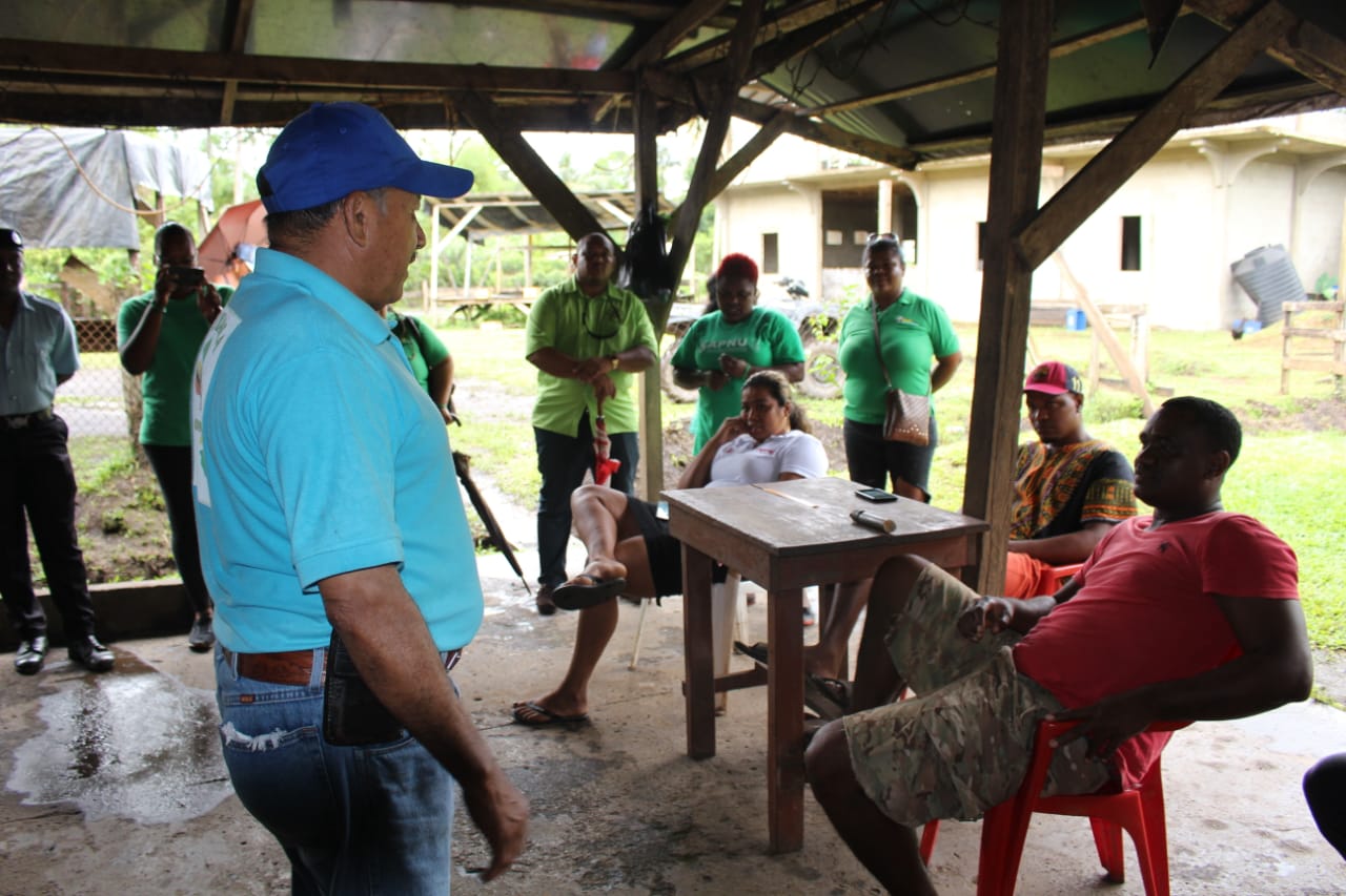 Minister Sydney Allicock engaging the residents in the Minab area, Matthew's Ridge