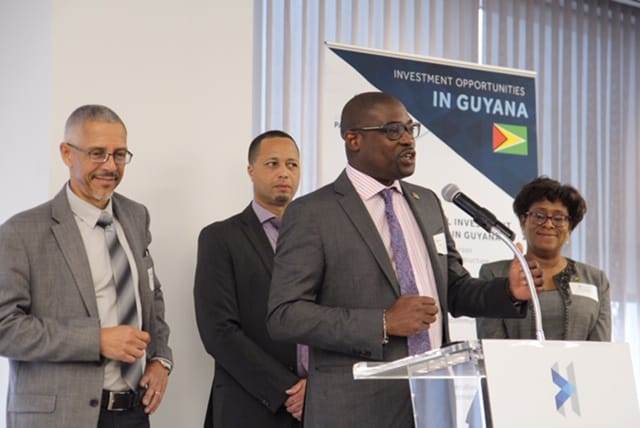 [In the photo, from left] Minister of Business, Dominic Gaskin, Guyana Office for Investment (GO-Invest) CEO, Owen Verwey [at the podium] Minister of Public Infrastructure, David Patterson and Minister of Public Telecommunications, Catherine Hughes at the Baker Institute’s forum on Oil and Gas Development in Guyana.