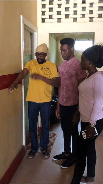 Rehabilitation and Habilitation Specialist, Molesimi Kono working with one of his trainees.