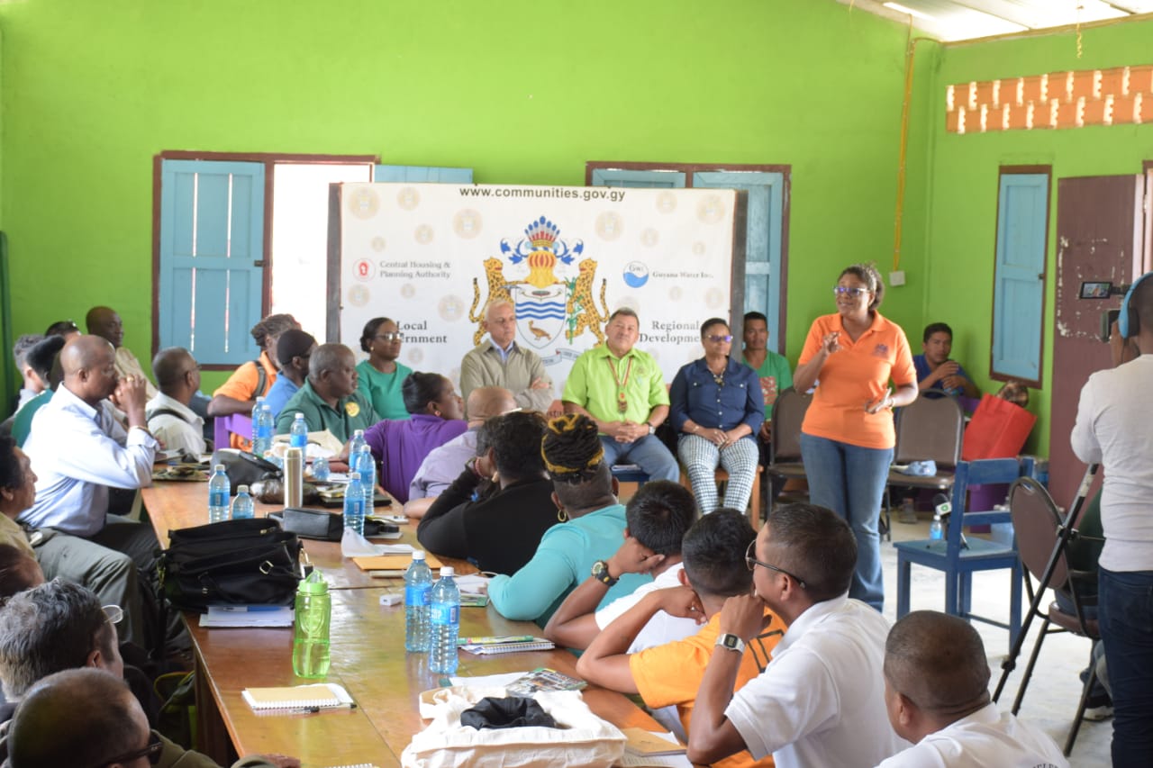 Minister of Public Telecommunications, Catherine Hughes addressing the Region 8 village leaders and administrators. [Seated from left] Minister of Education, Dr. Nicolette Henry, Minister of Communities, Ronald Bulkan, Minister of Indigenous Peoples’ Affairs, Sydney Allicock, and Minister of Public Health, Volda Lawrence