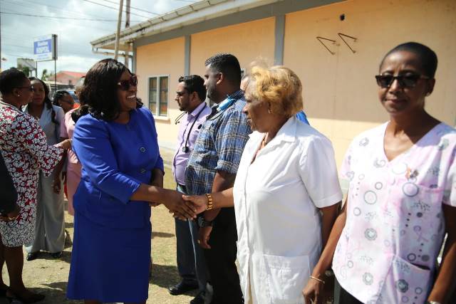 Minister within the Ministry of Public Health, Dr. Karen Cummings greets staff at the Skeldon District Hospital.