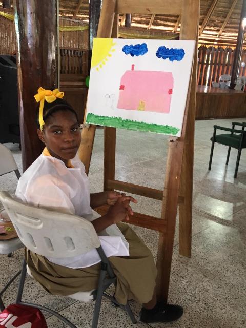 Students showcasing their artwork