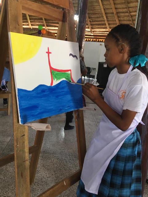 Students showcasing their artwork