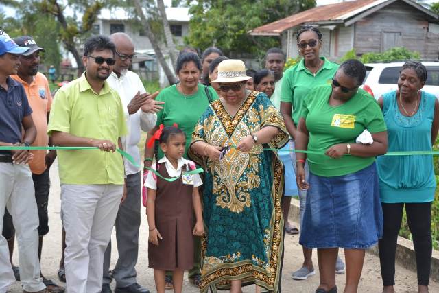 Minister of Social Protection, Hon. Amna Ally and His Worship the Mayor of Georgetown, Pandit Ubraj Narine, commissioning the $314M sea defence project at Endeavour in the Essequibo Island of Leguan.
