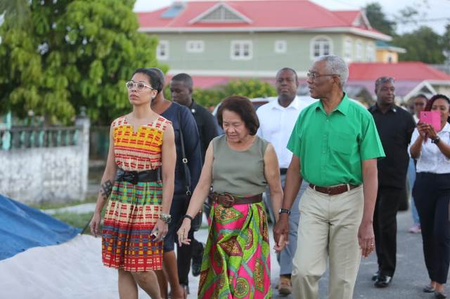 HE President David Granger, First Lady Sandra Granger and their daughter Afuwa Granger make their make to the polling station.