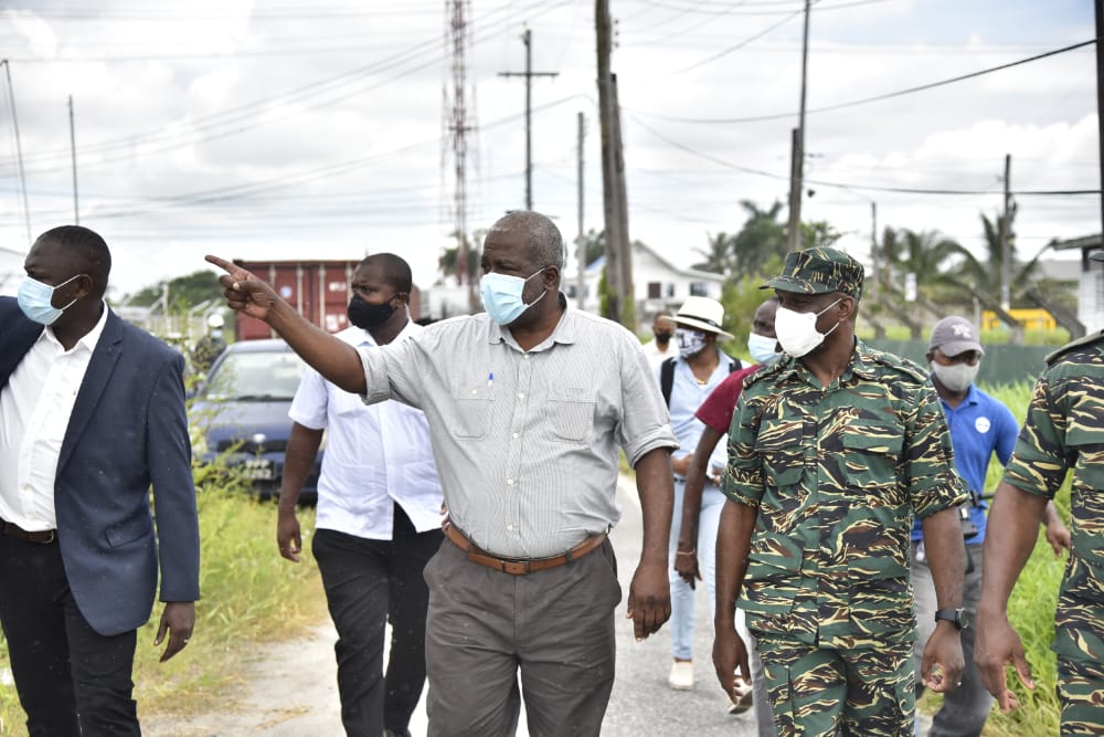 Prime Minister, Hon. (ret’d) Brigadier Mark Phillips accompanied by the Director-General of the CDC Lieutenant Colonel Kester Craig heading to the conduct the site assessment of the commission’s headquarters