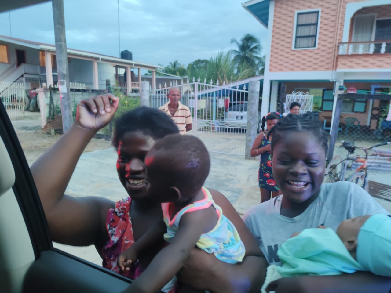 Young mothers bring their babies to greet His Excellency, Dr, Mohamed Irfaan Ali, as he visited the community of Canal Number 1, West Bank of Demerara.