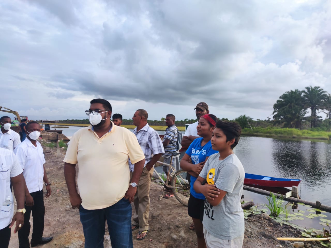 His Excellency, Dr, Mohamed Irfaan Ali, shares a moment with residents of canal Number 1, West Bank of Demerara.
