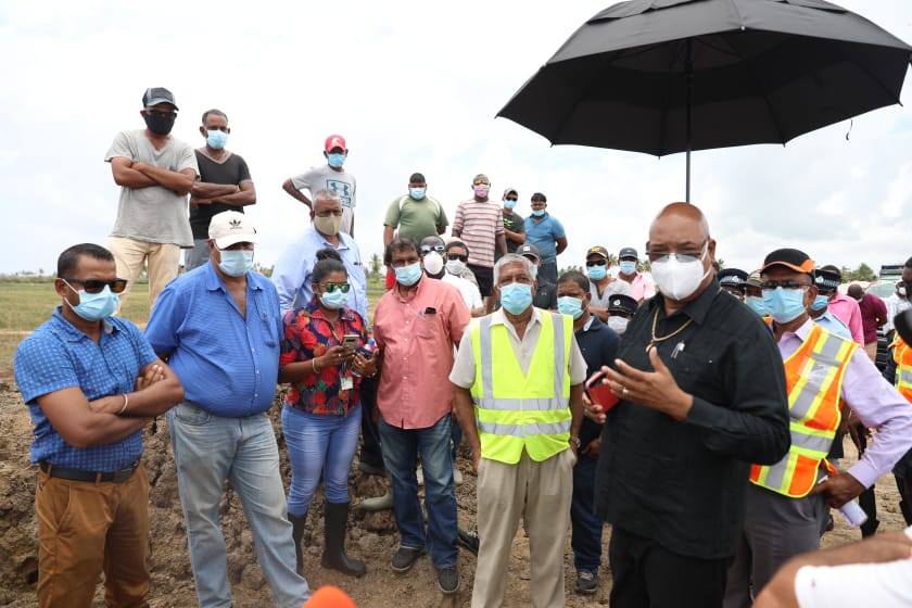 Minister of Public Works, Hon. Bishop Juan Edghill, at the sea defence breach at Dantzig, Mahaicony, Berbice.