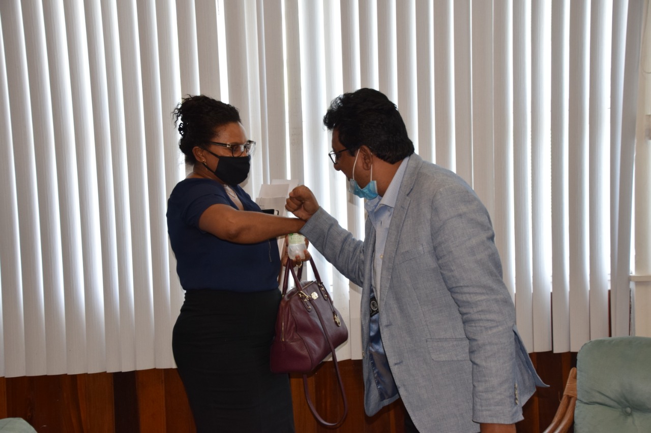 Attorney General and Minister of Legal Affairs, Hon. Mohabir Anil Nandlall, and the staff of the Financial Intelligence Unit (FIU)