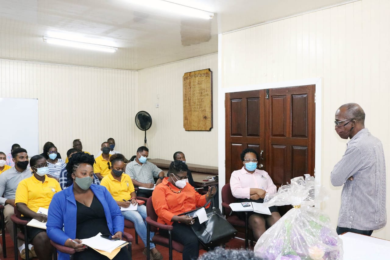 Minister of Labour, Hon. Joseph Hamilton, and staff of the Ministry of Labour, during their first meeting.