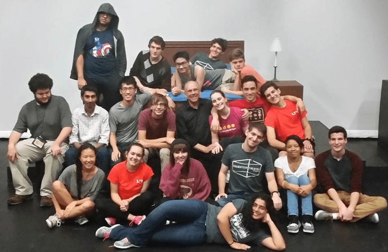 Drama Tech students posing for a group photo in different poses