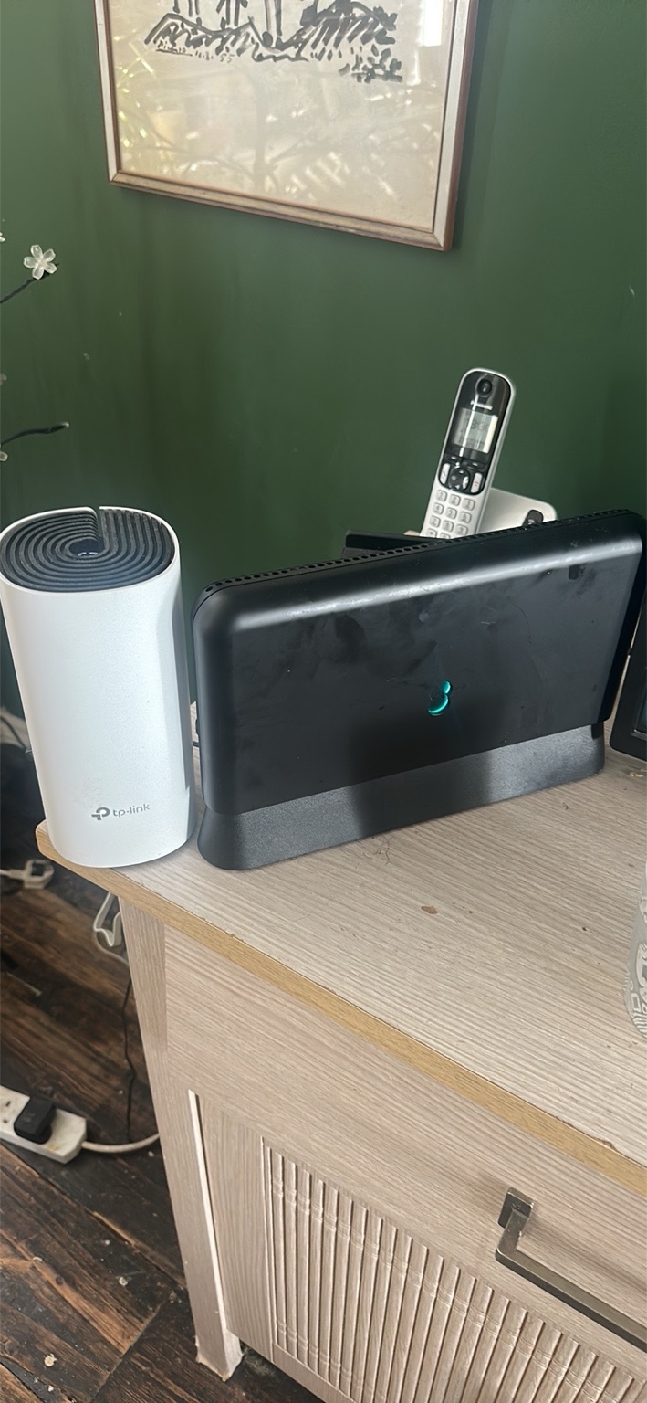 BT router with TP-Link WiFi equipment in a home