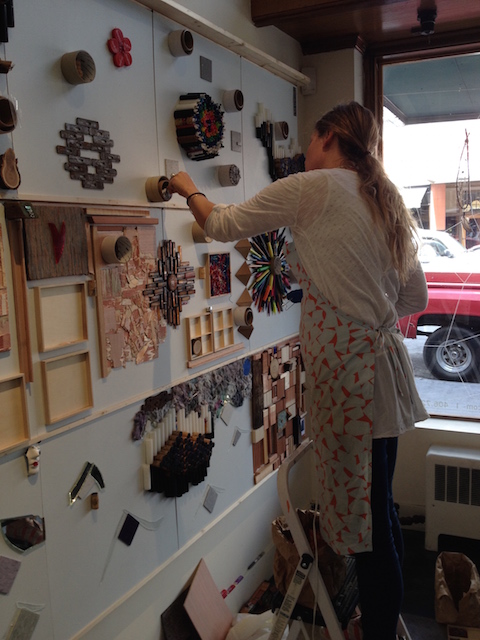 My Amazing Assistant putting paper rolls inside tape rolls