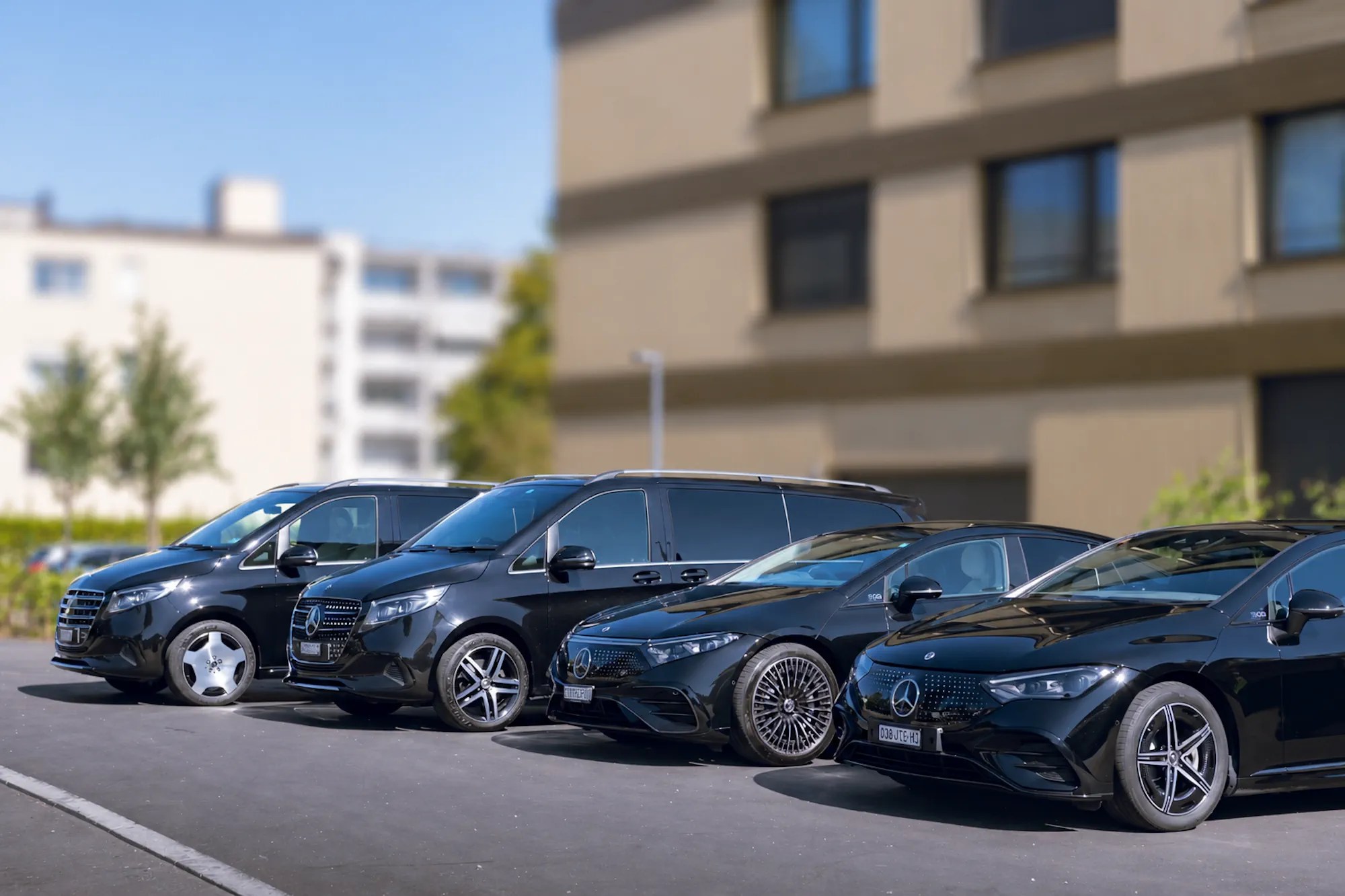 Driveguard chauffeur fleet: Mercedes EQE business sedan in front of the S-Class and V-Class