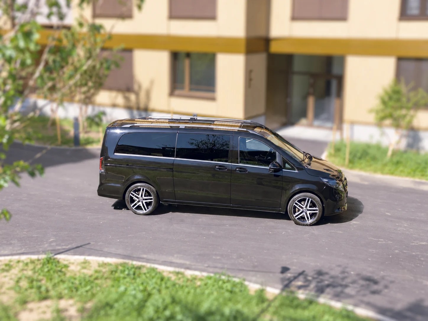 Black Mercedes V-Class van, side view