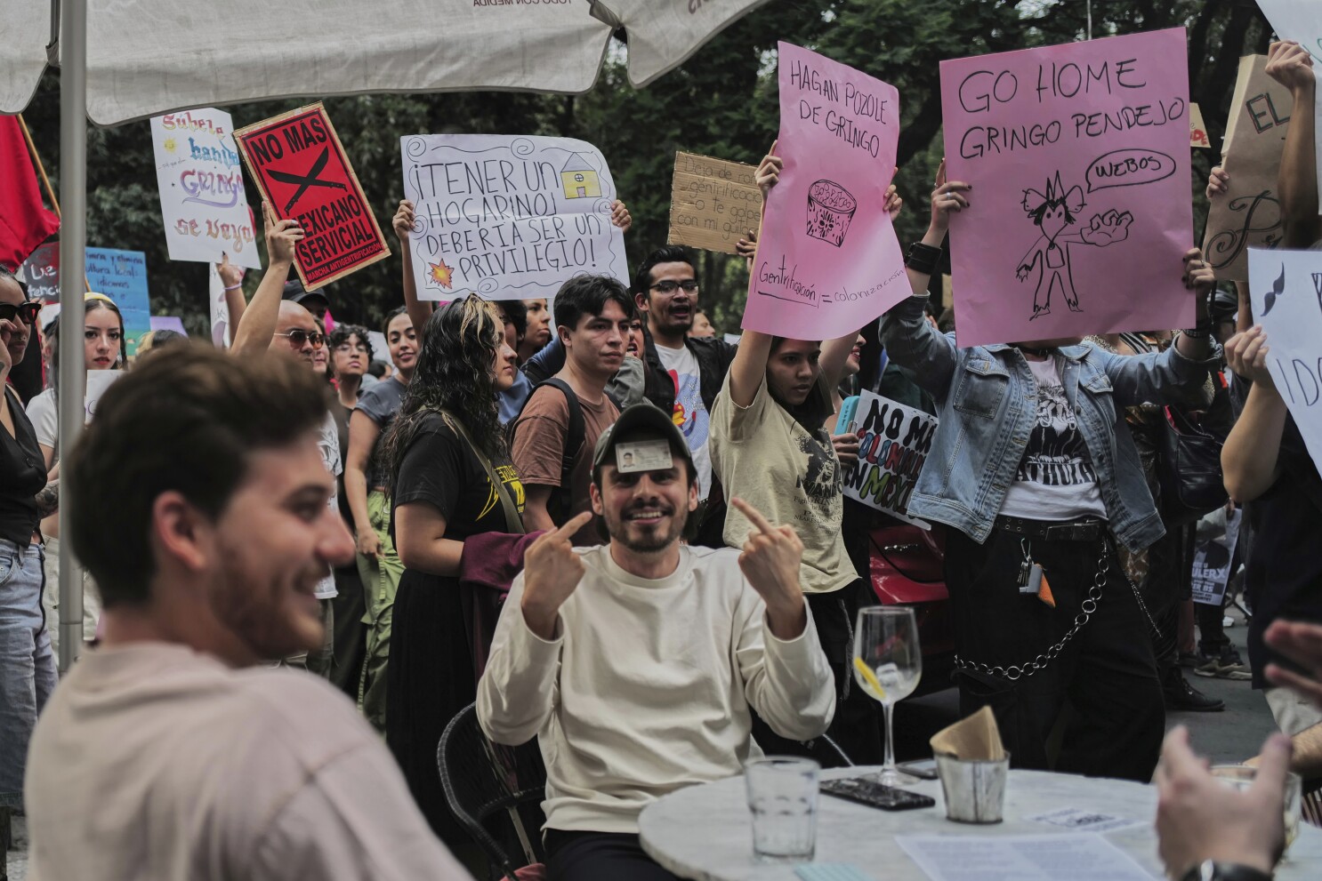 Protest over mass tourism in Mexico fuels debate over bias and lax housing rules