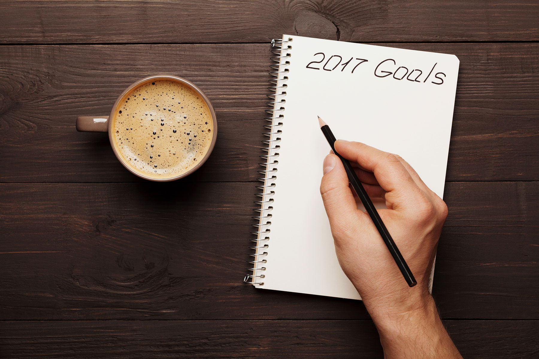 Hand writing out its goals for 2017.