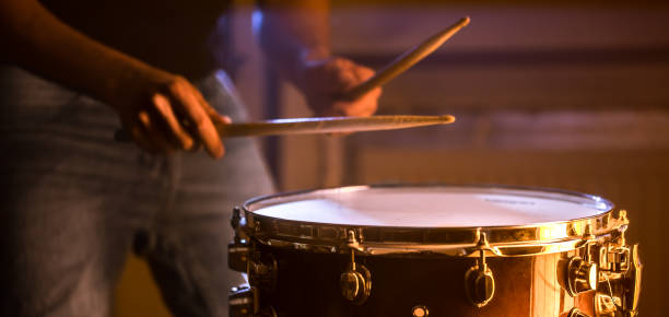 Drummer playing the snare drum
